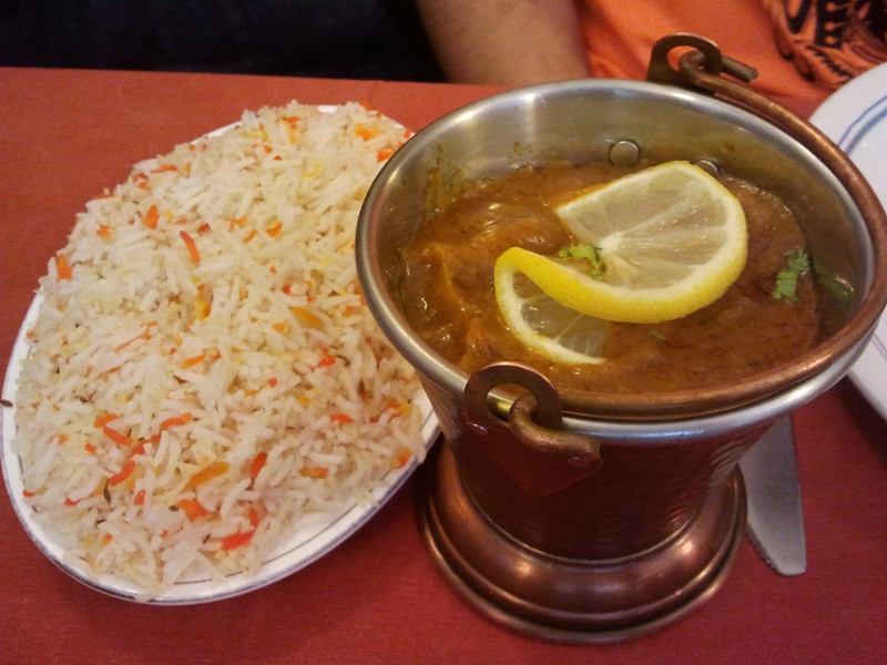 Taj Indian Arroz y ¿?